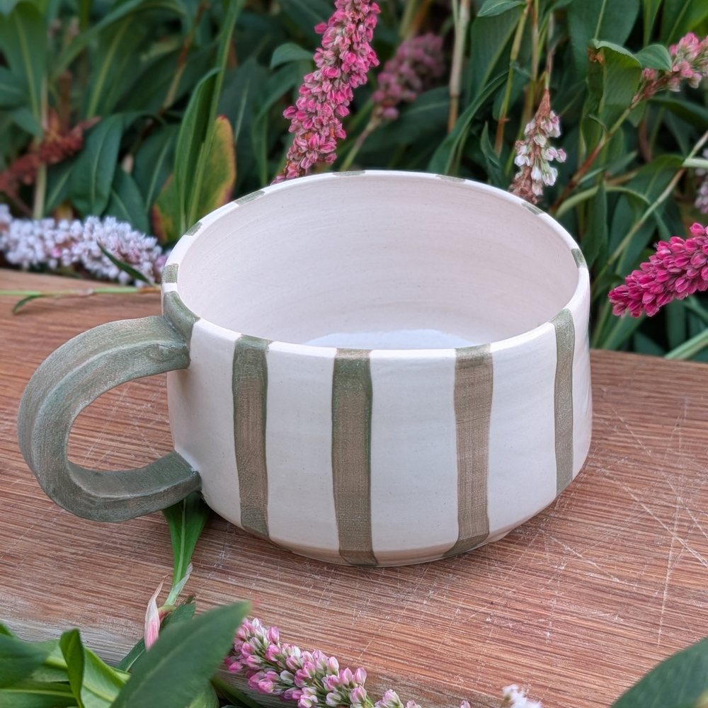 Handled mug with hand-painted moss green stripes and a green handle